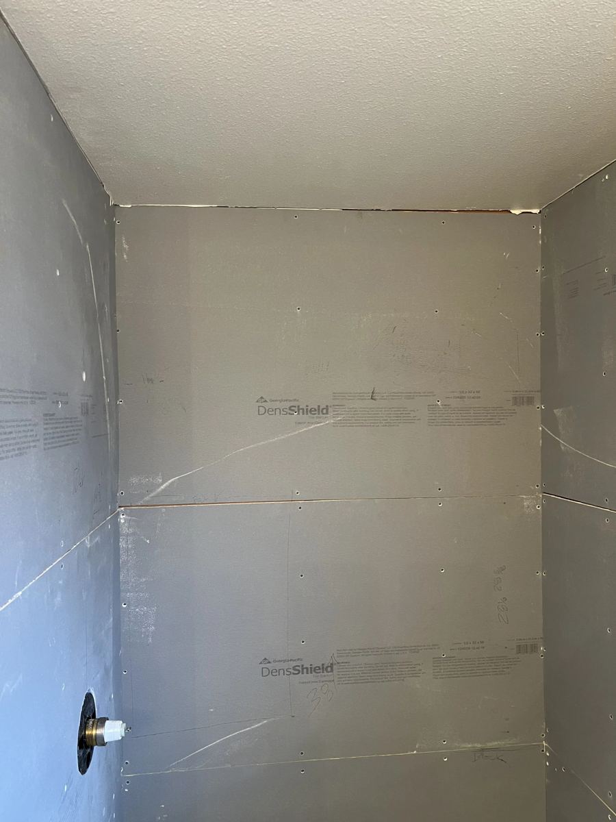 New shower wall panels installed during the remodel